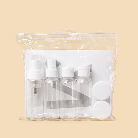 Набір тревел ємностей в косметичці